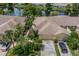 Community view of homes near a lake at 630 Tremont Greens Ln # 95, Sun City Center, FL 33573