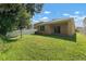 Large backyard with grassy area and privacy fence at 10920 Carlton Fields Dr, Riverview, FL 33579