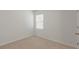 Simple bedroom with window and blinds at 10920 Carlton Fields Dr, Riverview, FL 33579