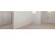 Clean entryway with neutral walls, carpet, and tile floors at 10920 Carlton Fields Dr, Riverview, FL 33579