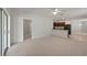 Living room with access to kitchen and patio at 10920 Carlton Fields Dr, Riverview, FL 33579