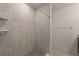 Modern shower with tile surround and built-in shelving at 10920 Carlton Fields Dr, Riverview, FL 33579