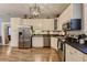 Well-equipped kitchen with stainless steel appliances and ample cabinetry at 5602 N Ola Ave, Tampa, FL 33604