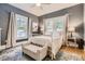 Charming bedroom with hardwood floors and neutral decor at 5602 N Ola Ave, Tampa, FL 33604