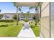 Inviting courtyard with lush landscaping and seating areas at 5728 14Th N Ave # 104B, St Petersburg, FL 33710