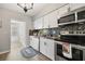 Updated kitchen with stainless steel appliances and a butcher block countertop at 5728 14Th N Ave # 104B, St Petersburg, FL 33710
