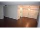 Bright dining room with dark hardwood floors and a chandelier at 4335 Aegean Dr # 106A, Tampa, FL 33611