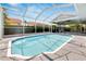 Relaxing screened pool area, perfect for outdoor enjoyment at 2028 Berry Roberts Dr # 52, Sun City Center, FL 33573