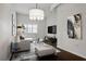 Bright living room features a comfy sofa and large TV, perfect for relaxing at 520 S Armenia Ave # 1232, Tampa, FL 33609