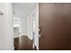 Bright entryway with hardwood floors and keyless entry at 520 S Armenia Ave # 1232, Tampa, FL 33609
