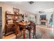 Dining room features a wood table and hutch, and views to the kitchen at 1120 Estatewood Dr, Brandon, FL 33510