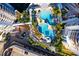Aerial view of resort-style pool and surrounding buildings at 1209 E Cumberland Ave # 807, Tampa, FL 33602