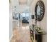 Elegant entryway with a large mirror and a glass-top console table at 1209 E Cumberland Ave # 807, Tampa, FL 33602