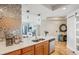 Modern kitchen with stainless steel appliances and mosaic backsplash at 1209 E Cumberland Ave # 807, Tampa, FL 33602
