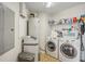 Convenient laundry room with washer, dryer, and storage at 1209 E Cumberland Ave # 807, Tampa, FL 33602