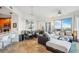 Open-concept living area with city views, comfortable seating, and dining area at 1209 E Cumberland Ave # 807, Tampa, FL 33602