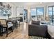 Spacious living area featuring a sectional sofa and stunning city views at 1209 E Cumberland Ave # 807, Tampa, FL 33602