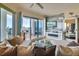 Spacious living room with city views and sliding glass doors to balcony at 1209 E Cumberland Ave # 807, Tampa, FL 33602