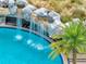 Beautiful waterfall feature adds a tropical touch to this property's refreshing clear blue pool at 1209 E Cumberland Ave # 807, Tampa, FL 33602