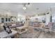 Open concept living space features comfortable seating and a stylish design at 13939 Swallow Hill Dr, Lithia, FL 33547