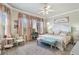 Serene main bedroom with soft lighting, comfortable furnishings and decorative touches at 13939 Swallow Hill Dr, Lithia, FL 33547