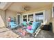 Cozy patio with comfortable seating, perfect for enjoying outdoor living and entertaining guests at 13939 Swallow Hill Dr, Lithia, FL 33547
