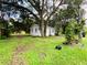 Cozy one-story house with large oak trees and a spacious yard at 5907 8Th S Ave, Tampa, FL 33619