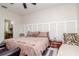 Main bedroom with a king-size bed and ensuite bathroom at 11038 Ancient Futures Dr, Tampa, FL 33647