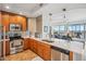 Modern kitchen with stainless steel appliances and white countertops at 1209 E Cumberland Ave # 807, Tampa, FL 33602