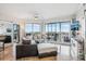 Spacious living room with floor-to-ceiling windows, offering stunning city views at 1209 E Cumberland Ave # 807, Tampa, FL 33602