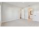 Spacious bedroom with ensuite bathroom and walk-in closet for ample storage space at 7404 Newham Ln, Sarasota, FL 34240