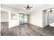 Bright dining room features grey vinyl flooring and sliding glass doors to a patio at 684 Corrientes Cir, Punta Gorda, FL 33983