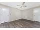 Bright bedroom with vinyl flooring and two entry doors at 684 Corrientes Cir, Punta Gorda, FL 33983
