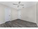 Bedroom with ceiling fan and doors at 684 Corrientes Cir, Punta Gorda, FL 33983