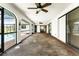 Poolside screened porch with ceiling fans at 684 Corrientes Cir, Punta Gorda, FL 33983