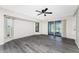 Bedroom with sliding door and hardwood floor at 684 Corrientes Cir, Punta Gorda, FL 33983