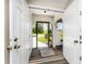 Front entry with double doors opening to a screened porch at 684 Corrientes Cir, Punta Gorda, FL 33983