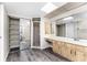Bathroom with shower and double vanity at 684 Corrientes Cir, Punta Gorda, FL 33983