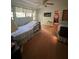 Bedroom with two beds and ample closet space at 15222 Lost Lake Ln, Lithia, FL 33547