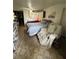 Bedroom with a queen bed, chair, and built-in cabinets at 15222 Lost Lake Ln, Lithia, FL 33547