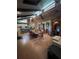 Dining room with large table and kitchen view at 15222 Lost Lake Ln, Lithia, FL 33547