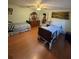 Two twin beds in a sunny bedroom with light wood floors at 15222 Lost Lake Ln, Lithia, FL 33547