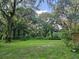Large backyard perfect for outdoor recreation at 15222 Lost Lake Ln, Lithia, FL 33547