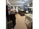 Workshop with workbench, shelves, and tools at 15222 Lost Lake Ln, Lithia, FL 33547