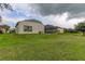 Single-Gathering home with a large grassy backyard at 25954 Risen Star Dr, Wesley Chapel, FL 33544