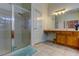 Walk-in shower with glass enclosure and tile flooring at 25954 Risen Star Dr, Wesley Chapel, FL 33544