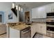 Kitchen with granite countertops and white cabinets at 25954 Risen Star Dr, Wesley Chapel, FL 33544
