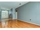 Spacious living room with hardwood floors and an entryway view at 25954 Risen Star Dr, Wesley Chapel, FL 33544