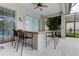 Relaxing patio with outdoor bar and seating at 25954 Risen Star Dr, Wesley Chapel, FL 33544