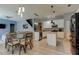 Modern kitchen with granite island and stainless steel appliances at 25954 Risen Star Dr, Wesley Chapel, FL 33544